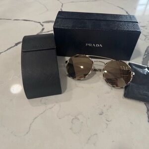 Prada Men's Sunglasses with Gold Frame